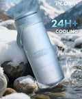 Portable Breast Milk Cooler Bottle With Digital Temp Display Keeps Nursing Bottles Fresh For Twenty Four Hours Using Swift Chill Cooling Tech No Sweat Design Blue beside snowy rocks.