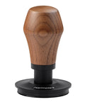 Heavy Duty Spring Loaded Espresso Coffee Tamper With Solid American Walnut Handle And Durable Titanium Base from a side angle.