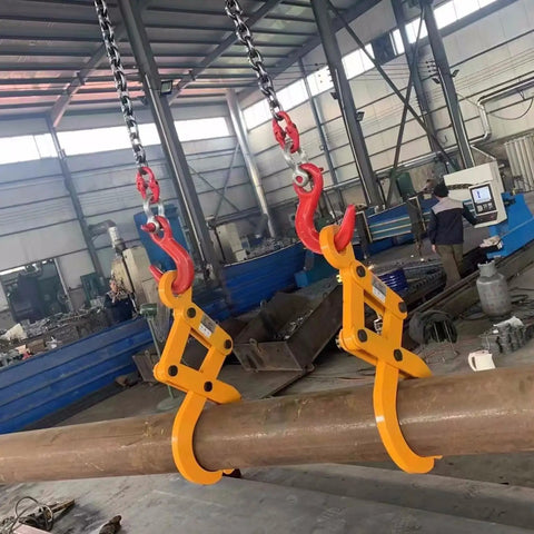 Two Heavy Duty Vertical Plate Lifting Clamps gripping a steel beam, designed for tough construction with a 3.1 ton capacity.