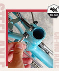 Installing Tamper Resistant Seatpost Lock For Bikes With 7 Lobe Security Key And Alloy Locking Bolt on a bicycle frame.