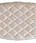 Single wooden joiner biscuit plate size 10 close-up for small woodworking projects handy for DIY cabinets and furniture