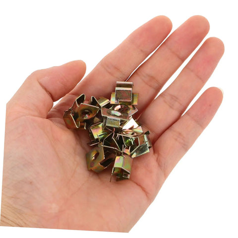 50 Pack Of Straight Up Solid Iron Captive Nut Fasteners With Top Shelf License Plate Screw Retainer Clips in hand.