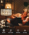 Sleek 21.6 Inch Black Industrial Bedside Lamp With Crystal K9 Shade in cozy living room setting