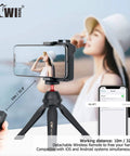 Compact Phone Camera Grip Handle With Tripod Mount Remote Shutter And Cold Shoe Adapter shown holding smartphone for video