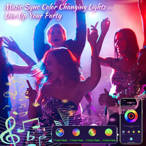 Party scene with people dancing under 4 Pack RGB LED Flood Lights With Stake Outdoor Color Changing Party Lights 150W Equivalent Dimmable White Light 2700K 6500K RGB Uplighting For Events App Control Via Bluetooth.