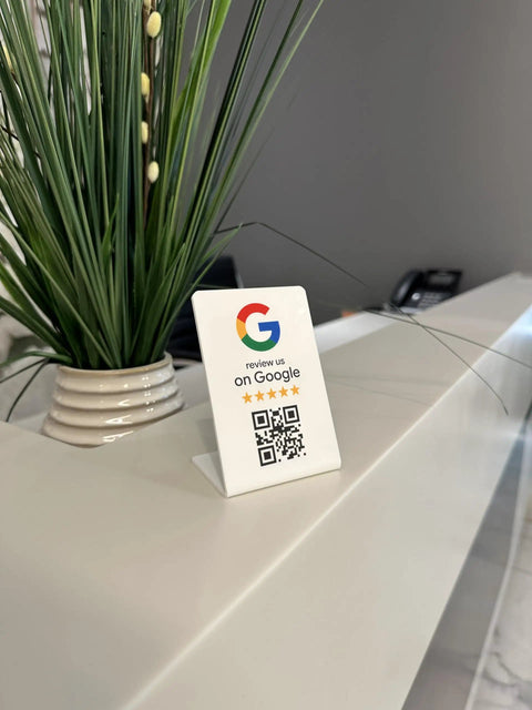 Gloss white Google Review Stand with NFC and QR code on a desk for flexible review page destination; 3-pack available.
