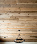 Saddlewood Reactive Wood Stain Lays Down A Deep Colonial Brown Coat With Real Tannin Action To Give Your Deck That Authentic Weathered Charm In A Straight Up Five Gallon Bucket - wood ceiling with rustic planks and chandelier.