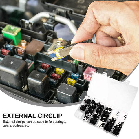 Hand using tool to apply All In One External Circlip Retaining Rings Kit With 328 Pieces In Black Manganese Steel in fuse box