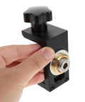 Adjustable Dowel Jig Kit With Precision Drill Guide Locator For Woodworking, hand holding metal guide with adjustable knob.
