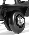 Close-up of wheel on Heavy Duty Folding Hand Truck With Four Wheels, Solid Construction Utility Cart For Luggage And Travel Gear, Black.
