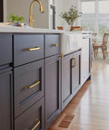 Ville Champagne Bronze Cabinet Pull In Five And One Sixteenth Inch Center To Center installed on dark kitchen cabinets