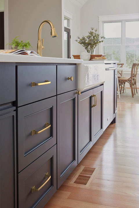 Ville Champagne Bronze Cabinet Pull In Five And One Sixteenth Inch Center To Center installed on dark kitchen cabinets