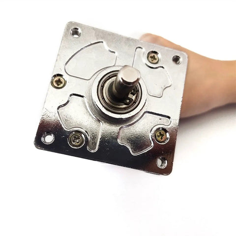 High Torque 775 Dc Gear Motor With Hella Powerful 80 Kgcm Output Runs On 12 Volt Or 24 Volt Power At 5 To 500 Rpm close-up view of motor's metal casing and shaft.