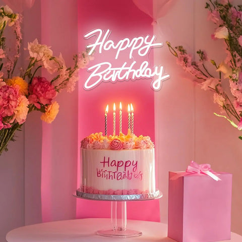Happy Birthday Neon Sign Dimmable LED Light For Backdrops And Party Decor above cake with candles, pink and floral decor