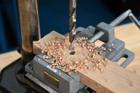 Seven-Eighths Inch HSS Brad Point Drill Bit for Wood in action creating clean splinter-free holes, pro-grade bit in drill press