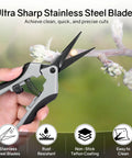 Six Point Five Inch Pruning Shears Set, Two Pack Garden Scissors with Stainless Steel Blades cutting a branch close-up