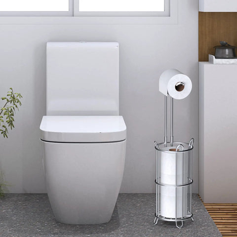 Bathroom scene with toilet and Toilet Paper Holder Stand And Tissue Roll Dispenser For Four Mega Rolls Freestanding Silver Rack