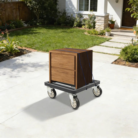 Heavy Duty Furniture Dolly With Smooth Rolling Locking Casters, Rock Solid Steel Folding Moving Platform, No Sweat Collapsible Hand Truck For Quick Sofa And Machine Moving, 1200 Lb Capacity carrying a wooden drawer cabinet outdoors.