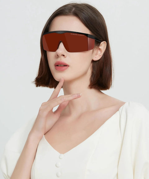 Built Tough Laser Safety Glasses Bringing Game Changing Od Five Plus Coverage From One Ninety To Five Fifty Nanometers worn by a model.