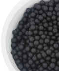Close-up of quarter inch rubber balls in a bowl, used as spacers in the Quarter Inch Rubber Ball Cabinet Door Spacers Auto Center Alignment Tool Hella Sturdy Raised Panel Gap Stabilizer Smooth Install Zero Slack Fit 500 Piece Kit For Professional Cabinetry And Home Improvement.