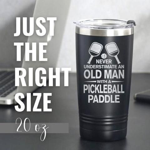 Dope Pickleball Gift For Men 20 Oz Stainless Steel Travel Tumbler featuring laser etched design and tight seal lid on a desk.