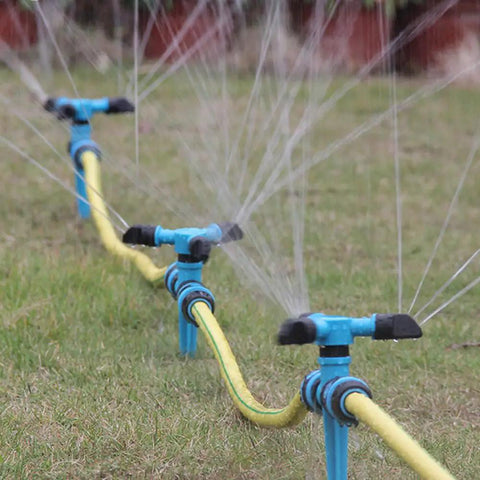 Three 360 Degree Rotating Lawn Sprinklers For Large Area Coverage With Adjustable Spray Directions on grass