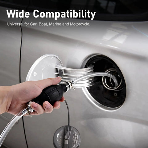 Slick Flexible Fuel Primer Bulb With Dual Check Valve in use at car fuel tank, showcasing manual pump functionality.
