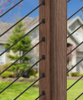 40 Pack Black 1/8 Inch Cable Railing Angle Beveled Protector Sleeves For Wood Posts, installed on outdoor stair railing.