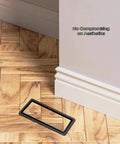 Hardcore Heavy Duty 4X10 Steel Floor Register installed in wood floor, showcasing sleek black faceplate and aesthetic design.
