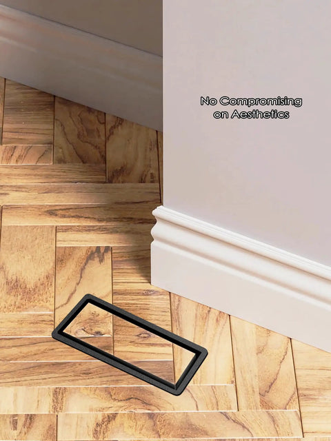 Hardcore Heavy Duty 4X10 Steel Floor Register installed in wood floor, showcasing sleek black faceplate and aesthetic design.