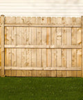 Wooden fence installed with PrimeGuard Plus Wood To Wood Deck Screw Tan Two And One Half Inch Self Starting Type 17 Point
