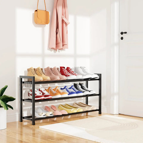 Space Saver Expandable Shoe Rack 18.5 To 33 Inches Wide 3 Tier Metal Shoe Organizer with shoes in entryway