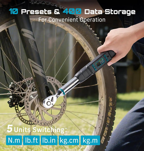 3/8-Inch Drive Digital Torque Wrench With LCD Display used on a bicycle wheel, showcasing real-time and peak modes, 0 to 220 Nm range