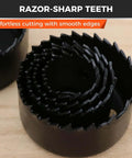 Hole saw kit, 8-piece set, black metal circular blades stacked together