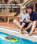 Father and child enjoying a 14-Inch High Speed RC Boat For Pools And Lakes Delivers Over 20 MPH Action, Auto Self Righting