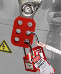 Close-up of Heavy Duty Lockout Tagout Station Kit 102 Pack with red electrical safety hasps and tags on steel gate lock mechanism.