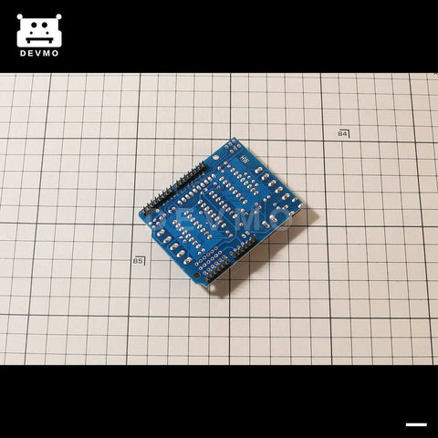 Arduino Compatible L293D Motor Driver Shield For Uno R3 Mega Duemilanove on grid surface