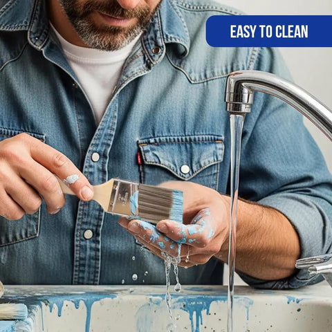Person cleaning brush under faucet with durable wood handle, part of 12 Pack 2 Inch Angle Paint Brushes For Trim And Walls.