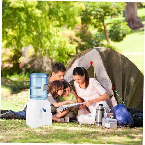 Family camping with Portable Water Dispenser And Compact Bucket Holder Faucet For Outdoor Camping And RV Use beside tent