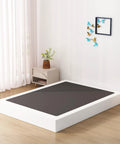 Rock Solid King Size Box Spring With Seven Inch Steel Bed Base Foundation and Dust Resistant Fabric Cover for Silent Nightly Rest and Quick Setup With Pro Grade Structural Support Inside placed in a modern bedroom.