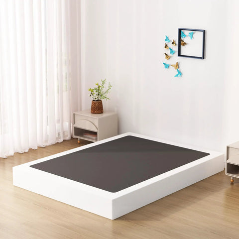 Rock Solid King Size Box Spring With Seven Inch Steel Bed Base Foundation and Dust Resistant Fabric Cover for Silent Nightly Rest and Quick Setup With Pro Grade Structural Support Inside placed in a modern bedroom.