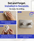 Installation steps for Heavy Duty Double Adhesive Wall Hooks Peel and Stick Towel Hook satin finish, no drilling required.
