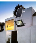 Tough As Nails Solar Powered Outdoor Security Lights With Remote Control waterproof LED wall lamp mounted on a modern home.