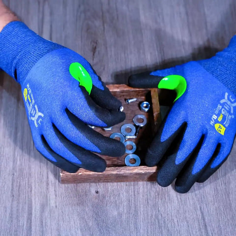 Ultra Thin 24G A5 Cut Resistant Gloves With HPPE Breathable Grippy High Dexterity Fit Nitrile Palm Coating With Micro Foam Grip For Precision Cutting Touchscreen Friendly Chemical Foamed Nitrile 3 Pairs Pack shown handling small hardware.