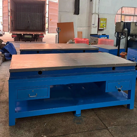 Top Notch Polished Mold Maintenance Bench with 8mm Thickened Steel Plate and Rock Solid Frame Built Tough for Serious Shop Projects Measuring 2500 by 1500 Millimeters, showing blue heavy-duty workbench in workshop.