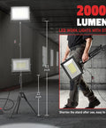 A Heavy Duty 200W LED Work Lights With Stand Two Pack Compatible With Milwaukee Battery 20000 Lumens Portable Tower Light on tripod.