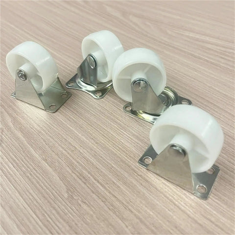 Hella Tough Eight Piece Heavy Duty Casters With Secure Locking Brakes And Smooth White Plate Mount Wheels Optimized For Furniture That Glides Like A Charm Today, white rubber wheels and metal mounts.