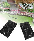 Left and Right Footprint Stepping Stone Mold Kit for DIY Garden Paths shown on lawn, featuring two black ABS plastic molds.