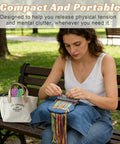 Woman using Knit Patch Loom Kit For Beginners And Mending 2.0 Mending Loom For Holes And Worn Spots On Clothes And Denim Includes 36 Threads For Visible Repairs And Reinforcement on denim outdoors.