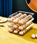 Three Layer Ramp Type Auto Rolling Egg Holder For Fridge, clear stackable storage, food grade PET, holds up to 18 eggs per layer
